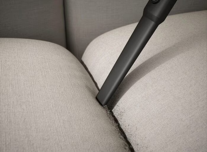 Vacuum the sofa thoroughly