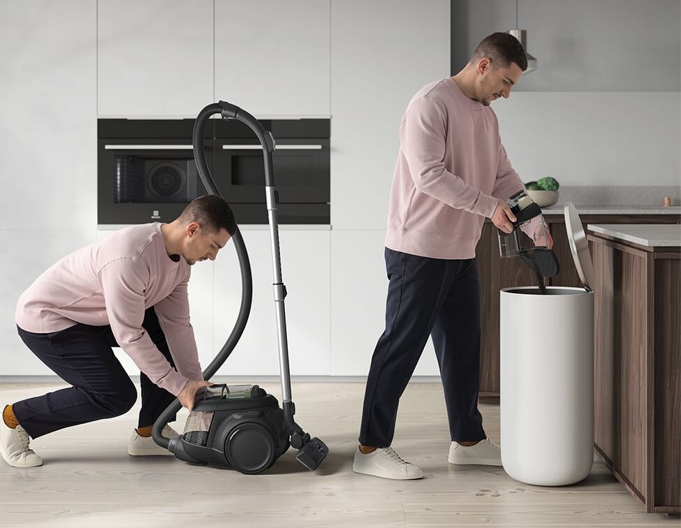 empty the vacuum dust bag